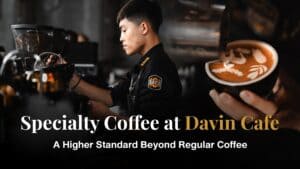 Article cover: "Davin Cafe Specialty Coffee: Why It's Different" showing a barista creating latte art and highlighting the brand's unique coffee expertise.