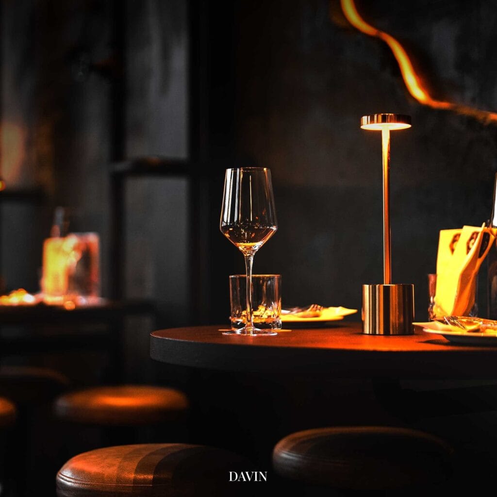 Intimate night hangout bar ambience with warm lighting, wine glass on the table, ideal for relaxed evenings, premium socializing, and upscale hangout experiences