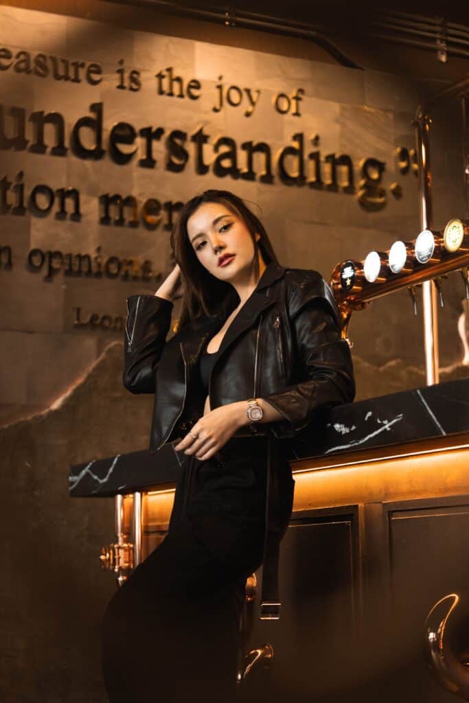 A photogenic cafe corner with industrial luxury bar design, warm lighting, and stylish atmosphere, perfect for lifestyle photography and social media content