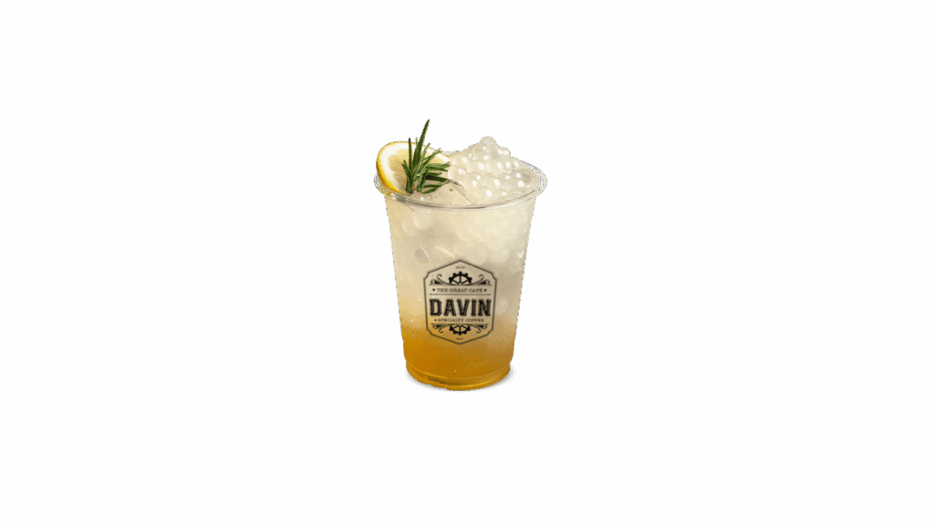HONEY LEMON REFRESHER at DAVIN CAFE cafe, fresh citrus sparkling honey lemon drink with rosemary garnish and crystal boba, sweet and tangy refreshing beverage for cafe lovers