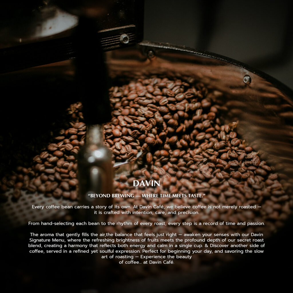 Coffee beans roasting inside a professional drum roaster at Davin Cafe, showcasing the precision behind light roast coffee development to highlight fruity aromatics and complex flavor profiles