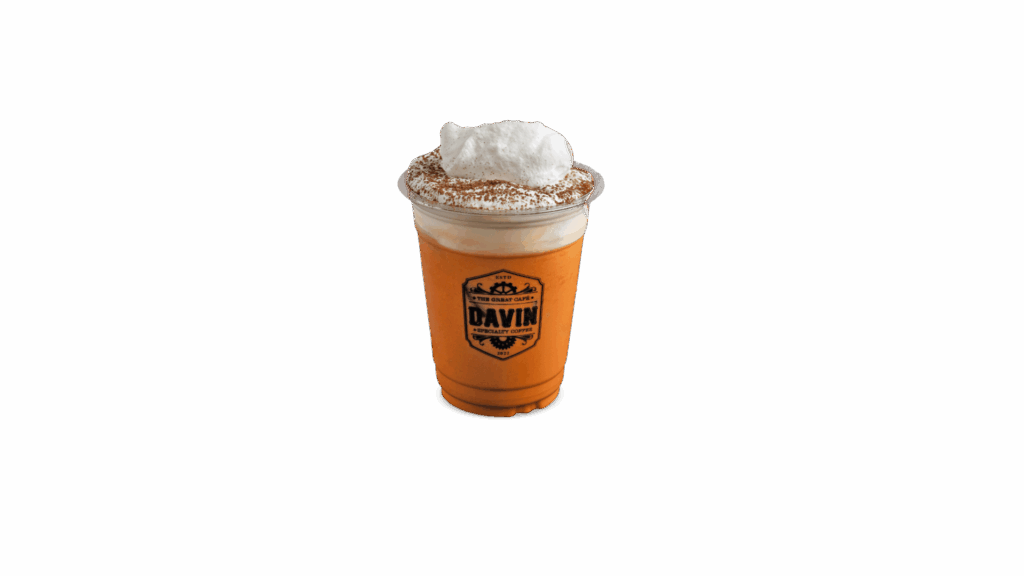 SOFT THAI TEA at DAVIN CAFE cafe, creamy Thai milk tea with soft milk foam and whipped cream topping, rich smooth and sweet premium Thai tea drink for cafe lovers