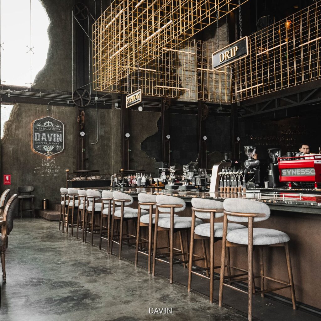 Luxury industrial coffee bar inside DAVIN CAFE, a stylish cafe near me on Ram Intra Expressway Bangkok, featuring specialty coffee, premium seating, aesthetic interior design, and a relaxing modern cafe atmosphere
