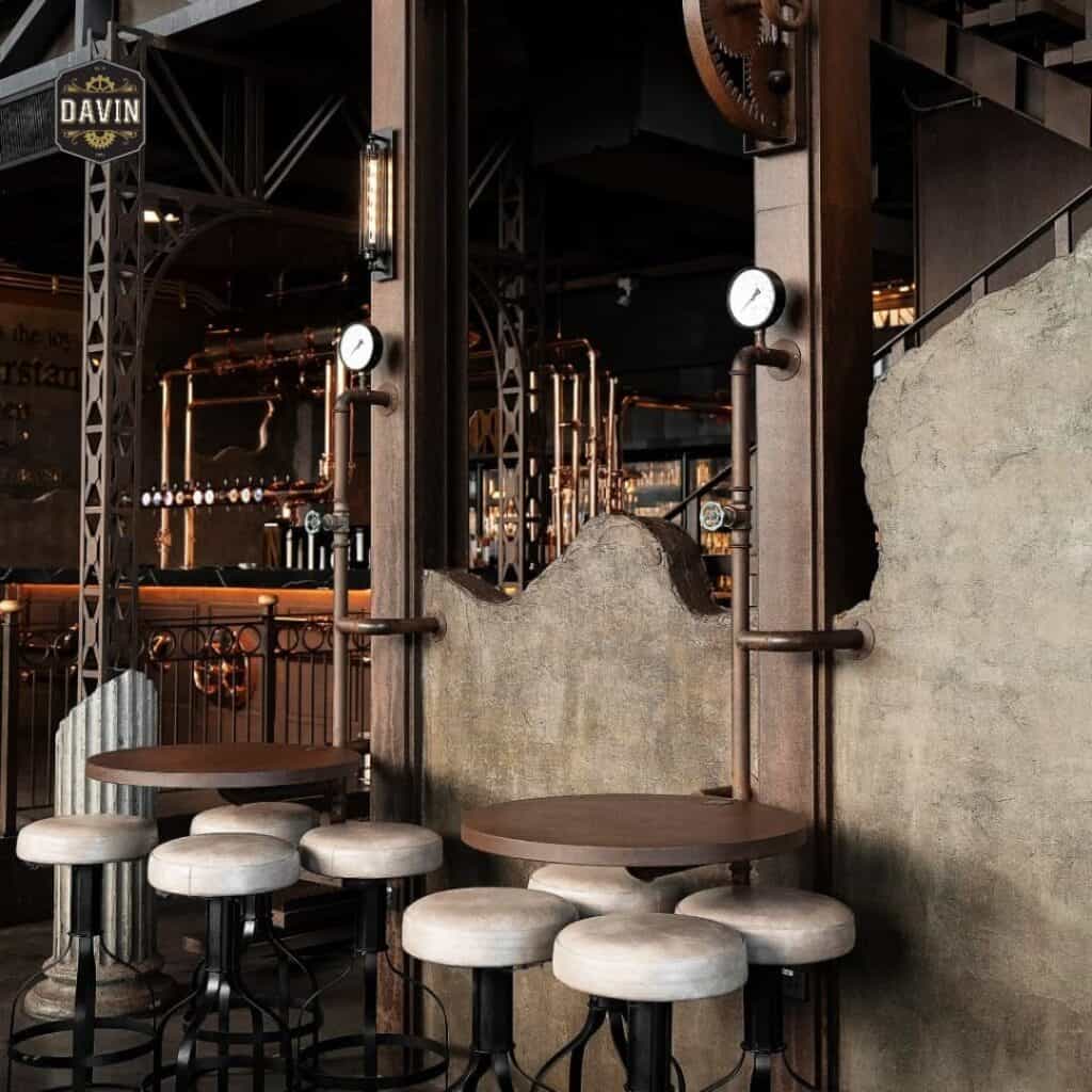 มุมที่นั่งสไตล์ Industrial ที่ DAVIN CAFE ร้านอาหารบรรยากาศดี กรุงเทพ โดดเด่นด้วยดีไซน์ลอฟต์ พื้นที่นั่งเป็นส่วนตัว และบรรยากาศอบอุ่น เหมาะสำหรับดินเนอร์ นัดพบ จิบกาแฟ และใช้เวลาพักผ่อนในกรุงเทพ