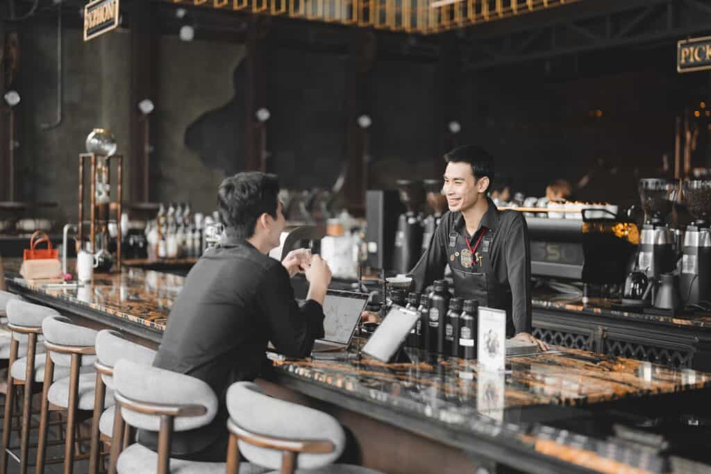 Popular cafe in Ramintra at DAVIN CAFE featuring a friendly barista, premium coffee experience, elegant café interior, comfortable seating, and warm hospitality for coffee lovers in Bangkok.