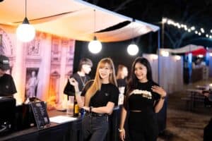 Brand exhibition booth with event staff at Davin Cafe in Bangkok