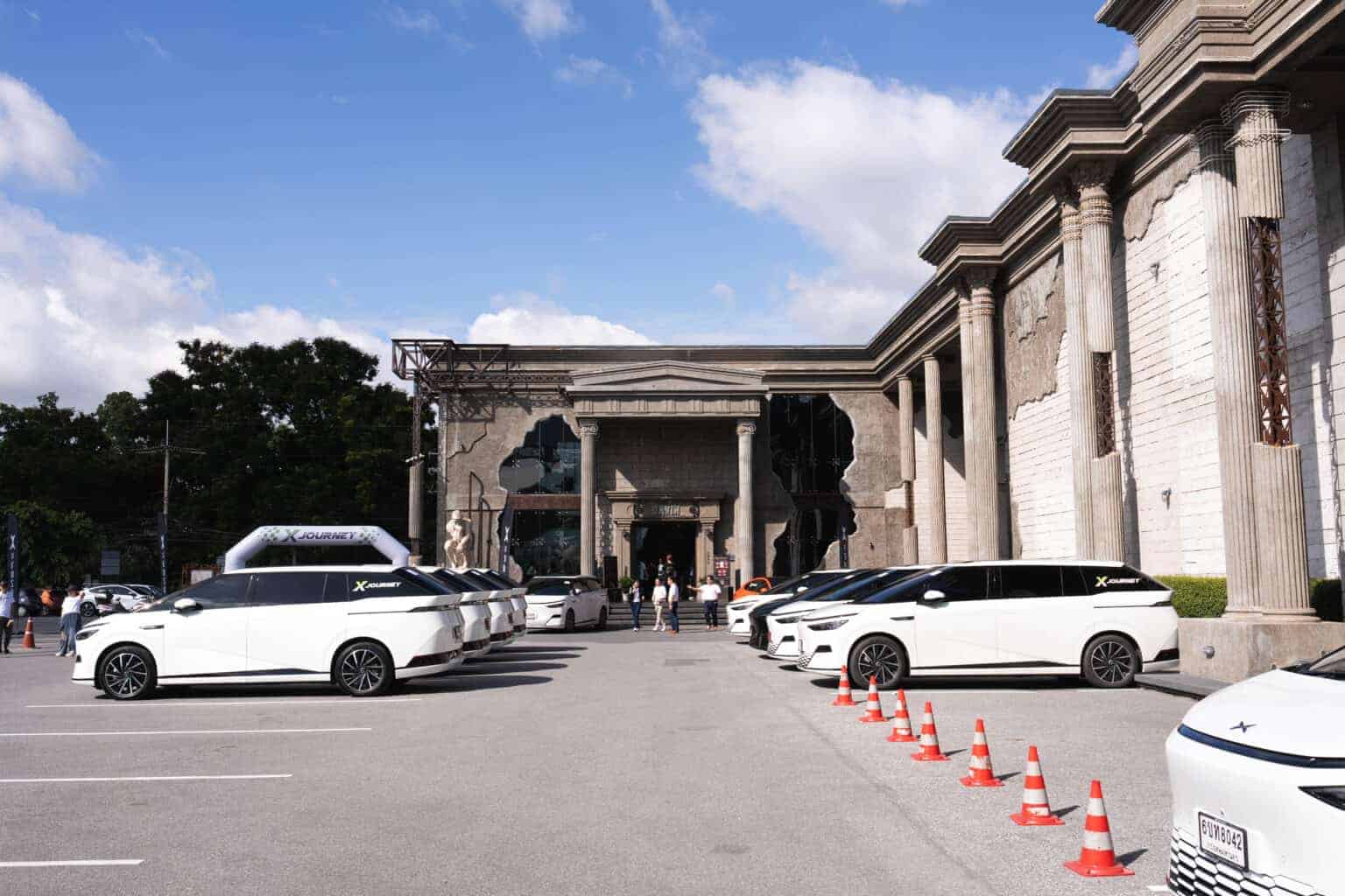 Vehicle exhibition setup outside Davin Cafe, suitable for automotive showcases and brand events in Bangkok