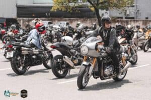Classic motorcycle riders arriving in style at a lifestyle community event hosted at our outdoor meetup space in Bangkok.