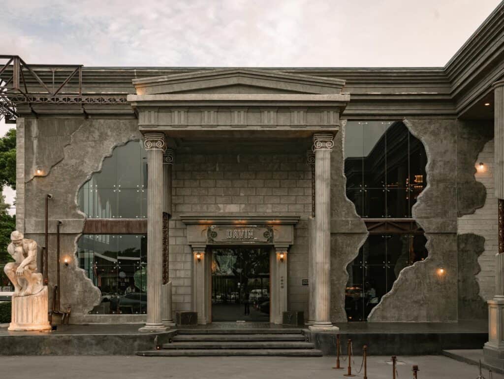 European-style cafe in Bangkok featuring classical Roman columns and distinctive architecture at DAVIN CAFE