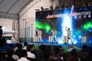 Live drum performance on a large stage for the JAC Motors launch at Davin Cafe's outdoor event space rental in Bangkok.