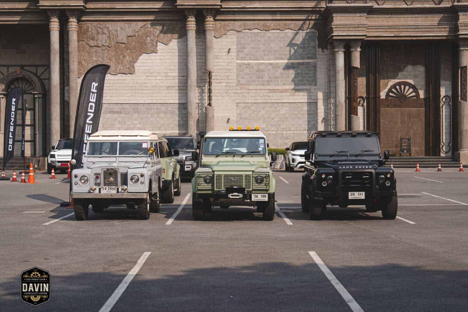 Classic and modern Land Rovers parked together during a car club gathering at our outdoor meetup space in Bangkok.