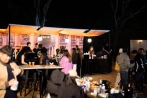 Outdoor brand booth and event space at Davin Cafe exhibition venue in Bangkok