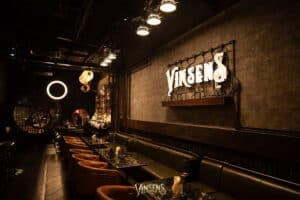 The stylish Vinsens bar and lounge area inside Davin Cafe, offering an elegant interior meetup space in Bangkok.