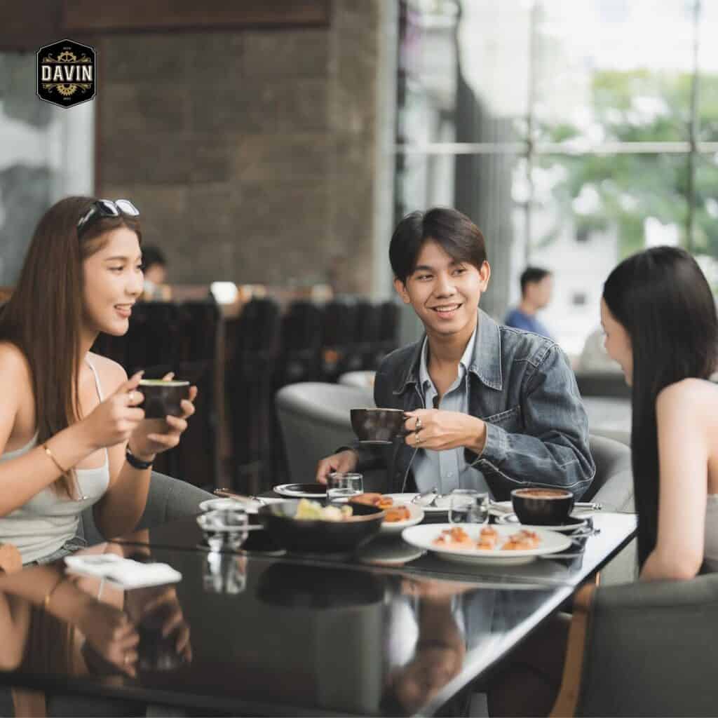 Brunch in Ramintra at DAVIN CAFE featuring European-style dishes and coffee in a bright, spacious glass-side dining area
