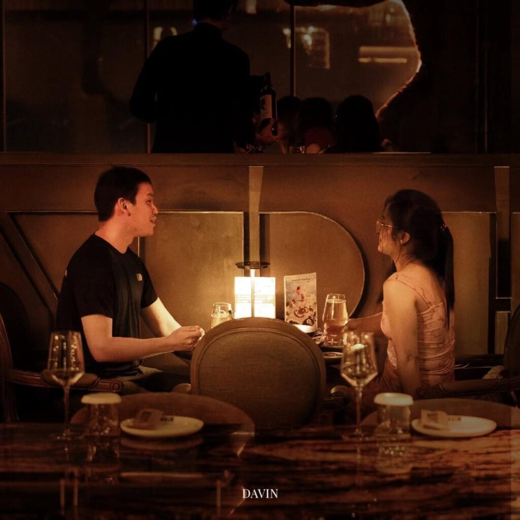 Romantic evening dining at DAVIN CAFE, a Golden Hour Cafe in Ramintra, with warm lighting and an elegant dining atmosphere